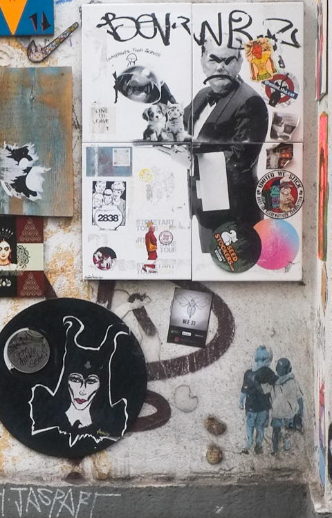 slaps, stickers, and other pasteups on a wall Heliosstrasse in Cologne