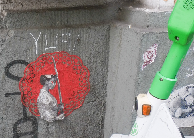 slaps, stickers, and other pasteups on a wall Heliosstrasse in Cologne