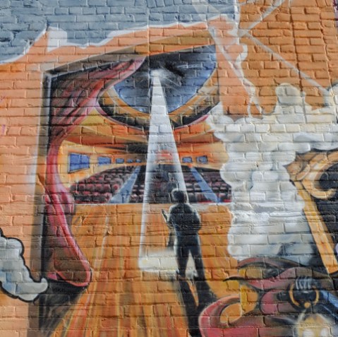 stage and theatre theme vignettes in a larger mural, spotlight on an actor