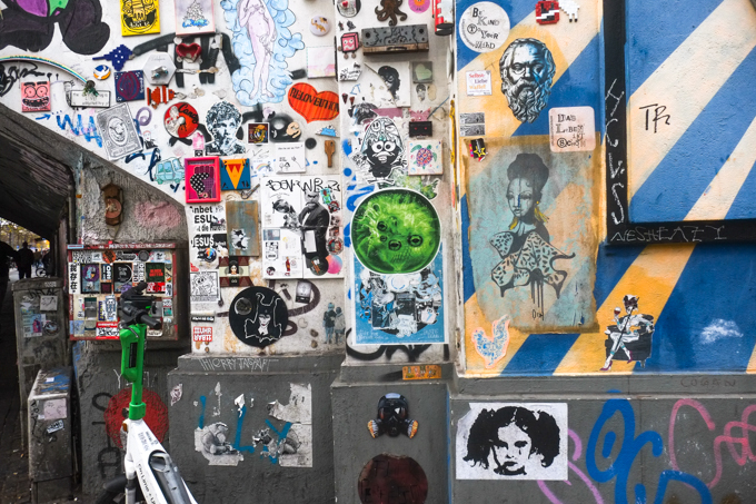 slaps, stickers, and other pasteups on a wall Heliosstrasse in Cologne