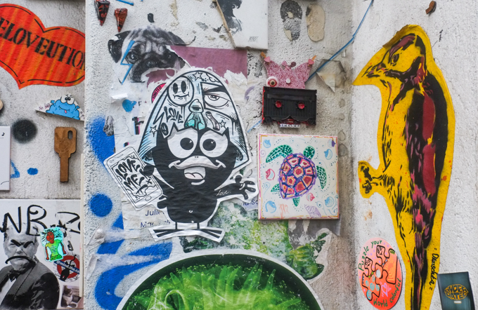 slaps, stickers, and other pasteups on a wall Heliosstrasse in Cologne
