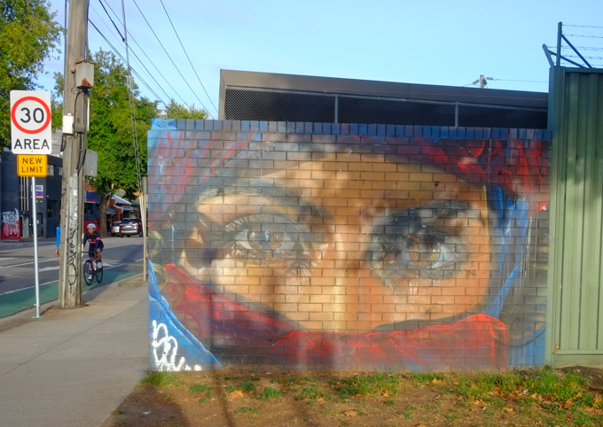 street art painting, portrait, a woman, by adnate, with head scarf and red cloth covering mouth