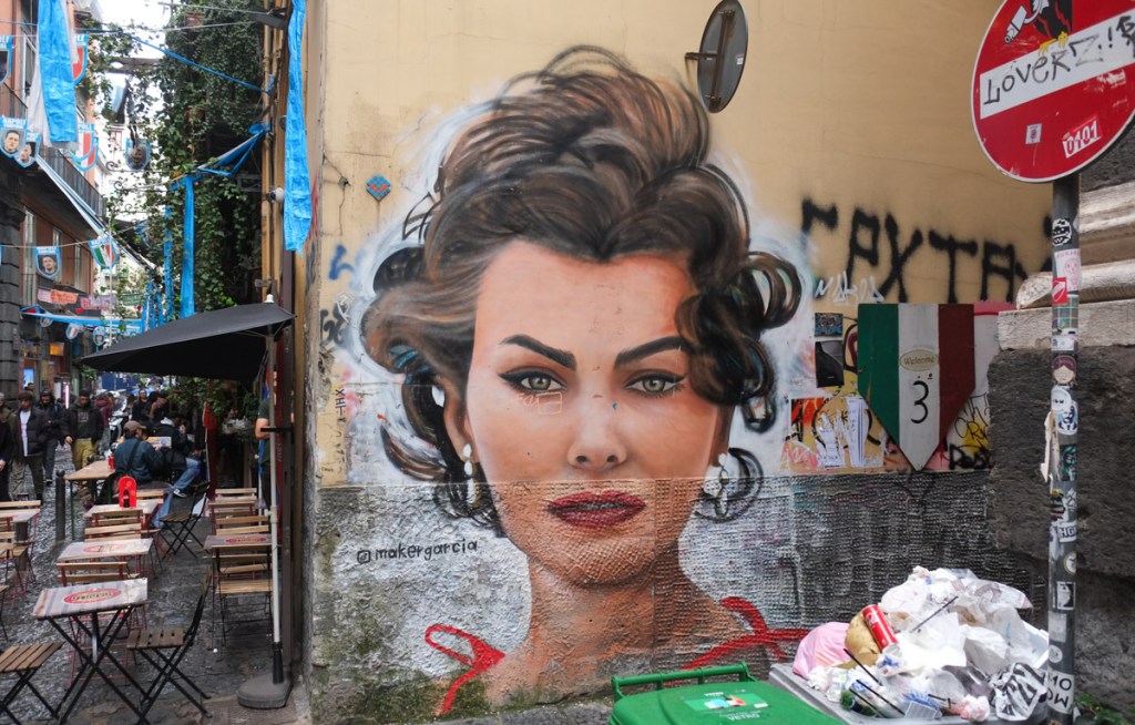 mural of Sophia Loren on a street in Naples