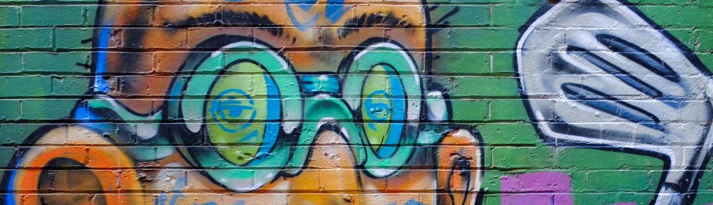 green glasses on the face of a man with face tattoos, holding a golf club in his hand