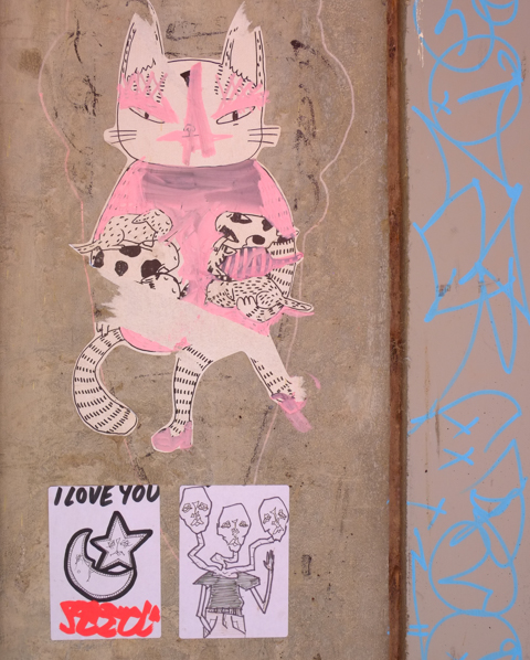 graffiti paste up - pink cat with 6 little kittens