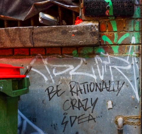 text graffiti that says be rationally crazy idea