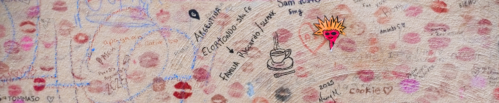 lipstick lip marks all over wall, exterior, kissing wall, in florence italy