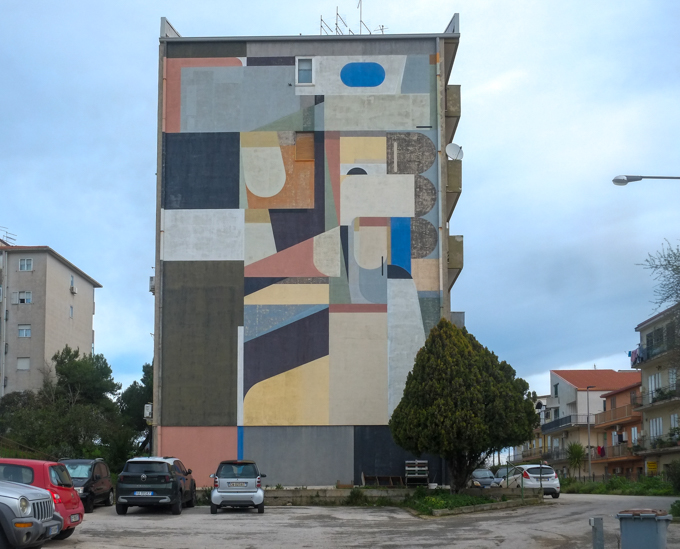 abstract mural on the side of a building by Alexey Luka