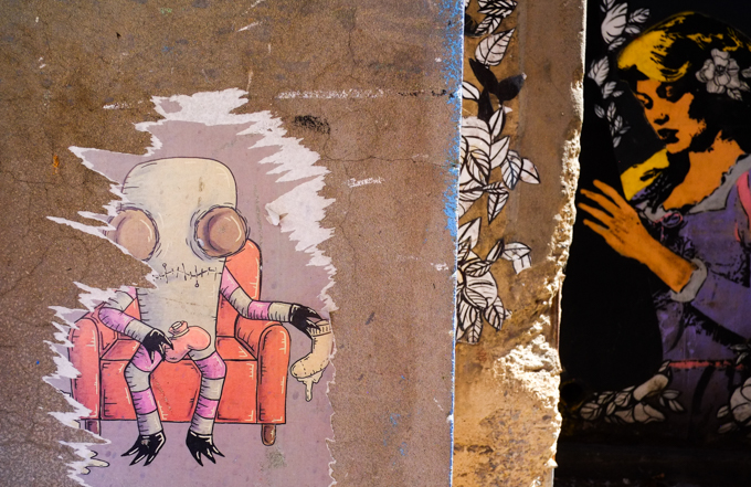 graffiti and street art, Mr. Dimples, a woman holding a bomb