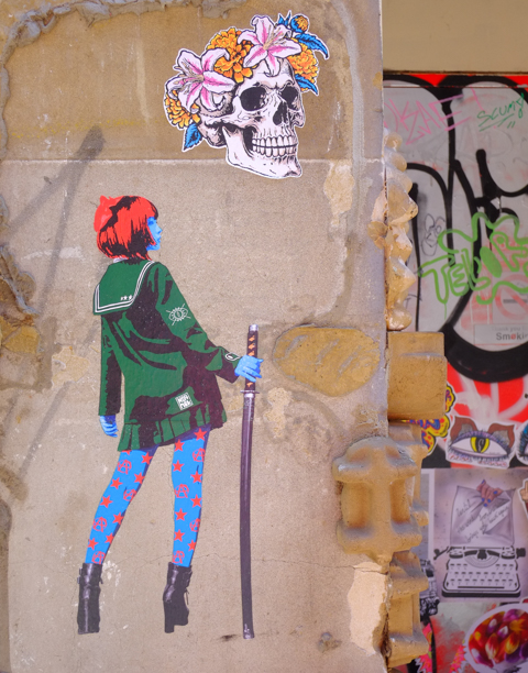 neftnik graffiti, woman with blue face and red hair, wearing green top and pleated skirt, carrying a sword