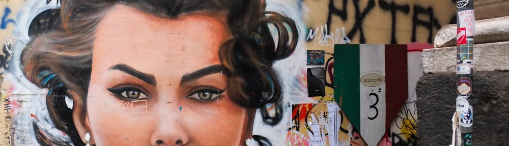 close up of part of Italian actress Sophia Loren's face in a street art mural in Napoli, Naples, Italy