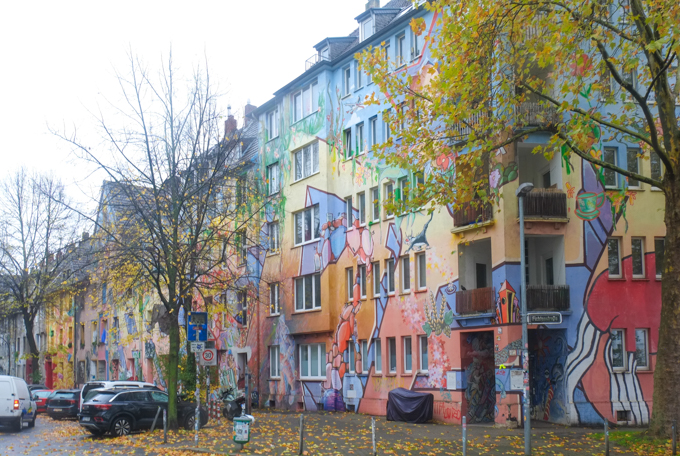 apartment blocks covered in murals, kiefernstraase