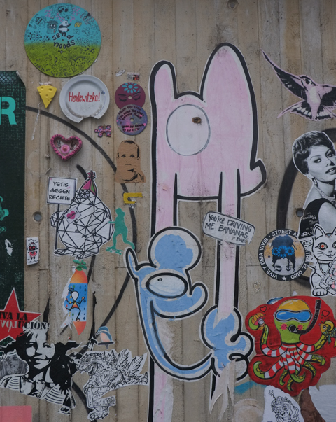 paste ups on a concrete wall