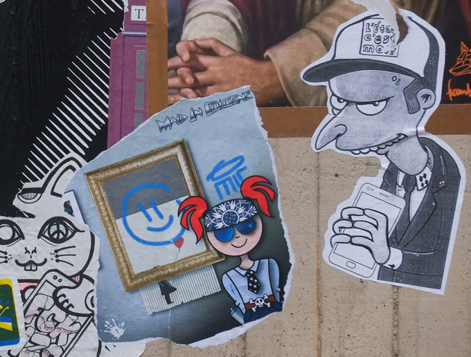 paste ups, one features Mr Burns from the Simpsons show