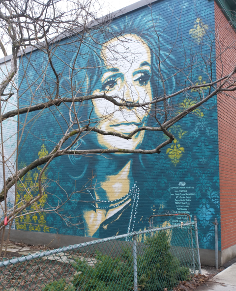 street art mural of Denise Pelletier by Matteo, in Montreal
