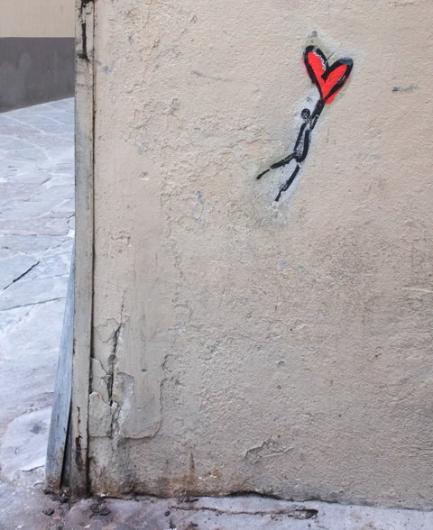 graffiti in Florence Italy by artist Exitenter, black drawing of a person