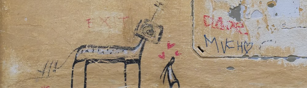 black marker drawing by artist exitenter on a wall in Florence, a small person with three hearts beside oa horse with a television head