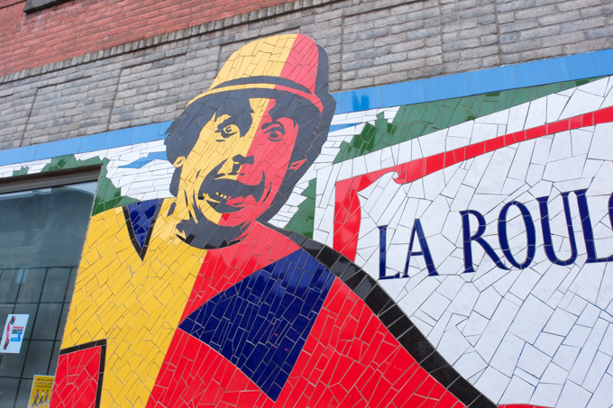 street art mural, that looks like mosaic, with words La Roulette, which was a theatre in Montreal.