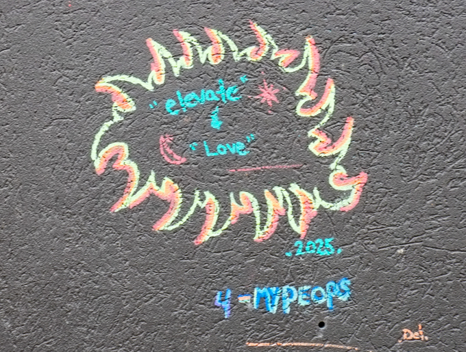 graffiti that is all text, words that say elevate love