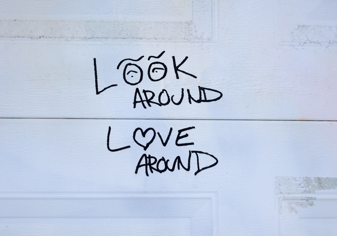 graffiti that is all text, words that say Look around, love around