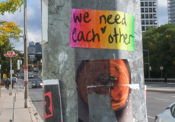 graffiti that is all text, words that say we need each other
