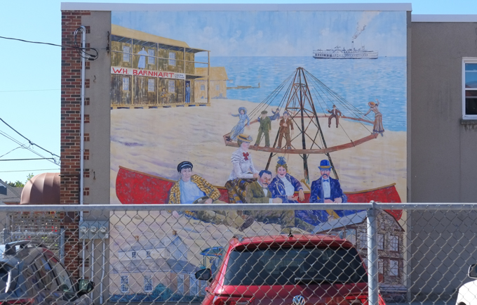 people sitting on the beach, Barnharts dance pavillion, in a mural by Tony Johnson