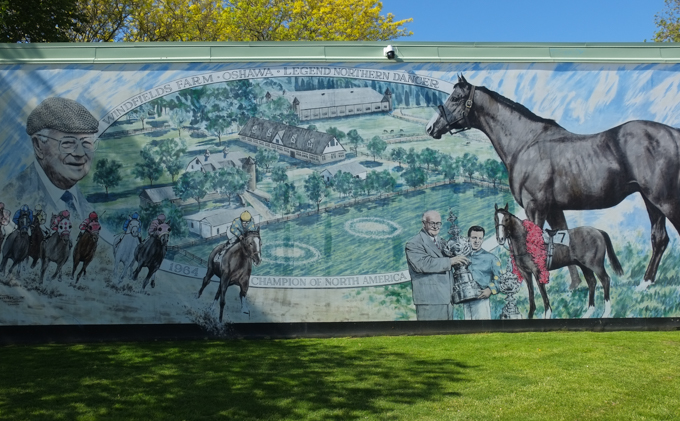 mural by David Yeatman showing E. P. Taylor and the Windfelds Farm in Oshawa where famous racing thoroughbred horse Northern Dancer was born