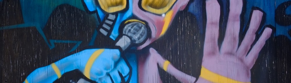 part of a larger mural, space alien speaking or singing into a microphone