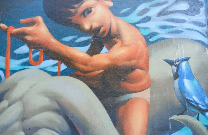 street art mural on wall of railway underpass on Bloor street West