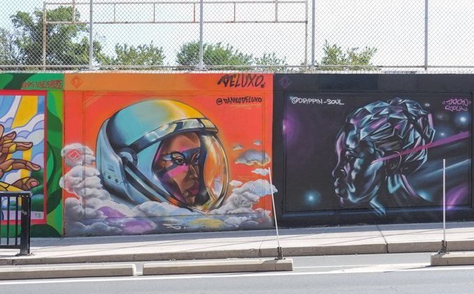two street art murals on wall of railway underpass on Bloor street West, Danilo Deluxo and Drippin' Soul