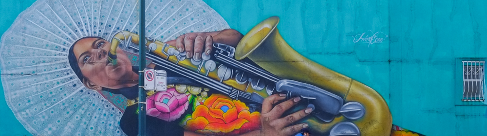 mural of a woman playing the saxophone