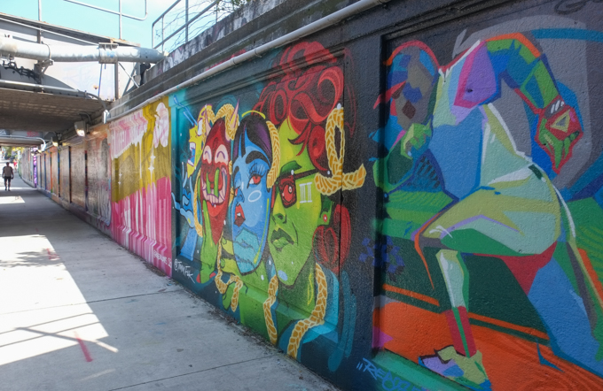 street art mural on wall of railway underpass on Bloor street West