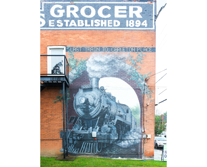 engine number 1226, large train engine, in mural about the last train to carleton place