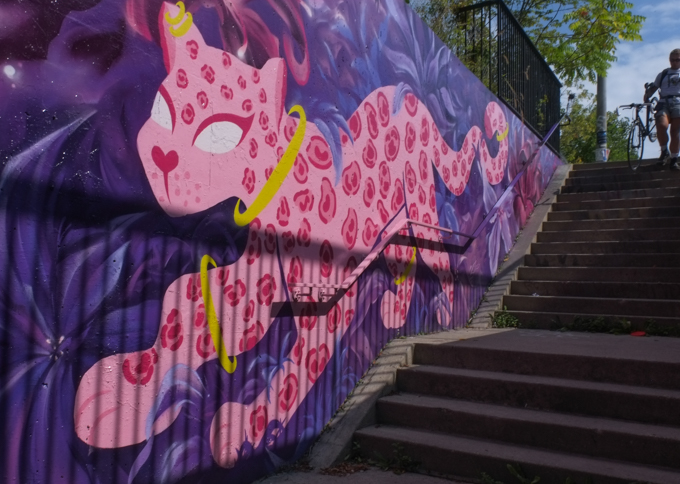 street art mural on wall of railway underpass on Bloor street West