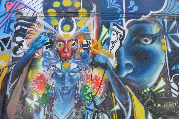 street art mural on wall of railway underpass on Bloor street West by Rowell Soller