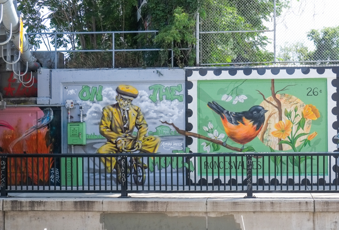 street art mural on wall of railway underpass on Bloor street West
