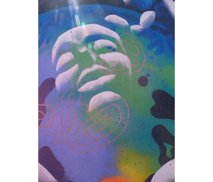 street art mural on wall of railway underpass on Bloor street West