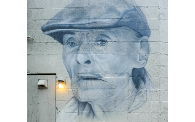 portrait, part of a mural dedicated to Wayne Richards, milkman, also known as wandering Wayne,