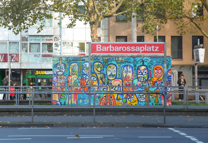 mural by Marcus Krips at platform at Barbarossaplatz station