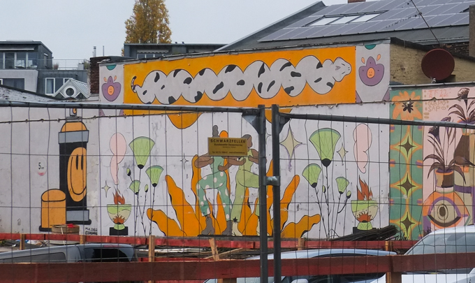 urban art, street art, in Cologne Germany, near Ehrenfeld station, mural behind a fence
