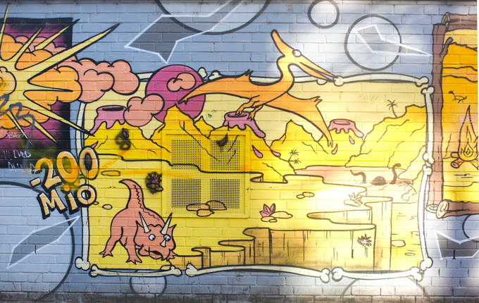 Belgian Quarter mural, volcano and dinosaurs