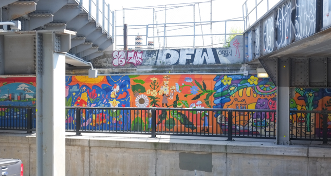 murals on wall of Bloor street railway underpass by , Isabella Fassler, Caitlin Taguibao, Andrea Manica, and Stephanie Avery