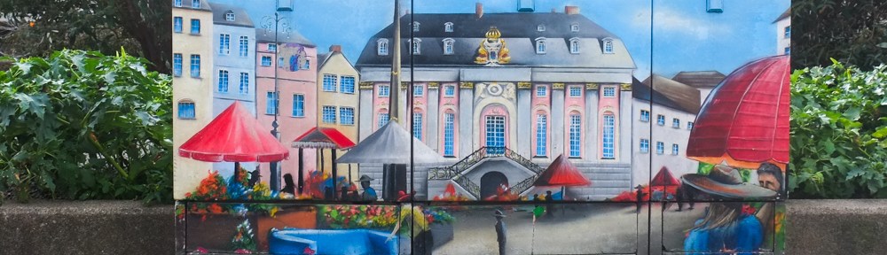 sidewalk box in Bonn with image of old city hall painted on it