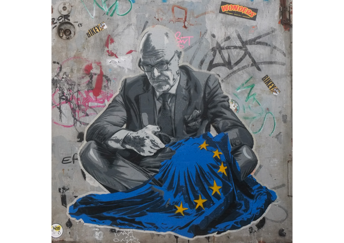 urban art, street art, in Cologne Germany, near Ehrenfeld station, stencil by SeiLeise, older man, seated, wearing suit cutting yellow stars off a European flag