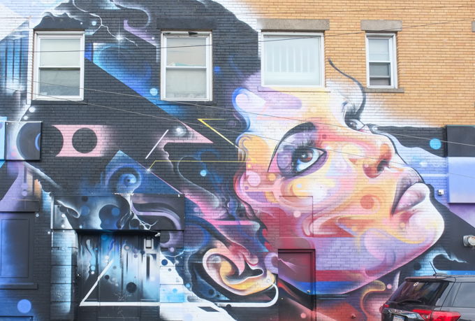 Mr. Cenz mural in Salem, woman's face 