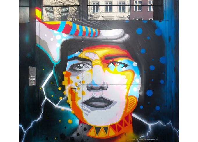 mural, face, by Henning Hüttner