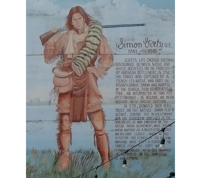 mural about Simon Ginty, picture of him along with many words describing his life