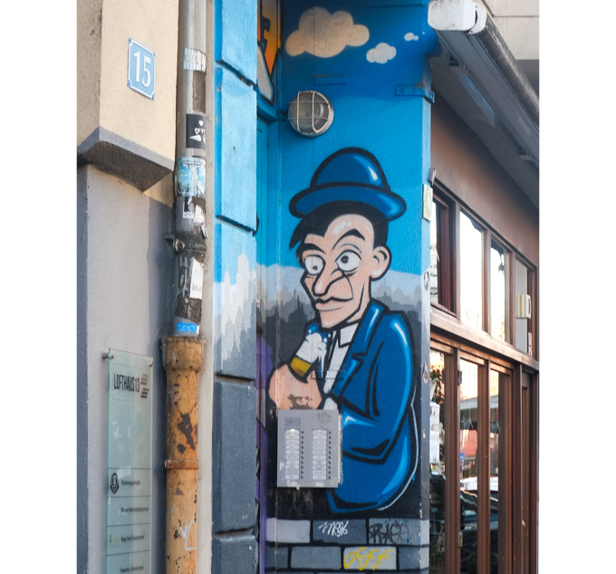 street art, man dressed in blue
