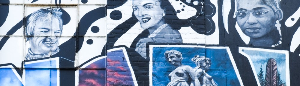 part of a mural in Springfield Massachusetts, large letters spelling the name of the city with lots of illustrations, in colour within the letters and in black and white surrounding the letters