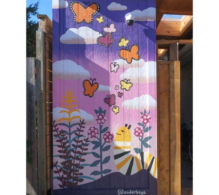 street art mural on garage door in Miriam Garfinkle Lane, by Sarah Whang